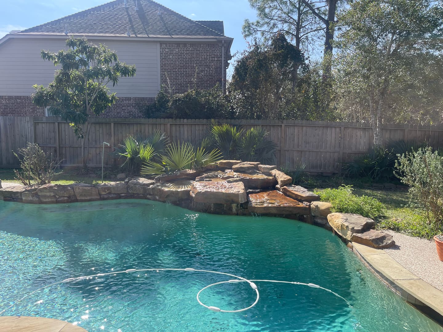 Landscape work near a residential pool area